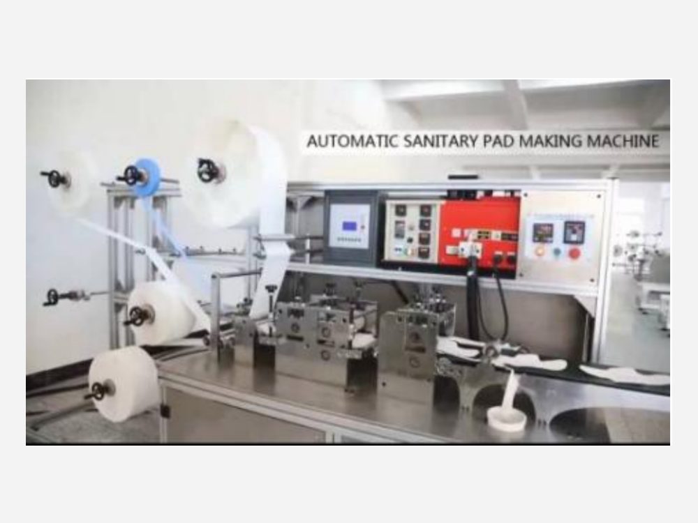 Full efficiency auto sanitary pad making machine